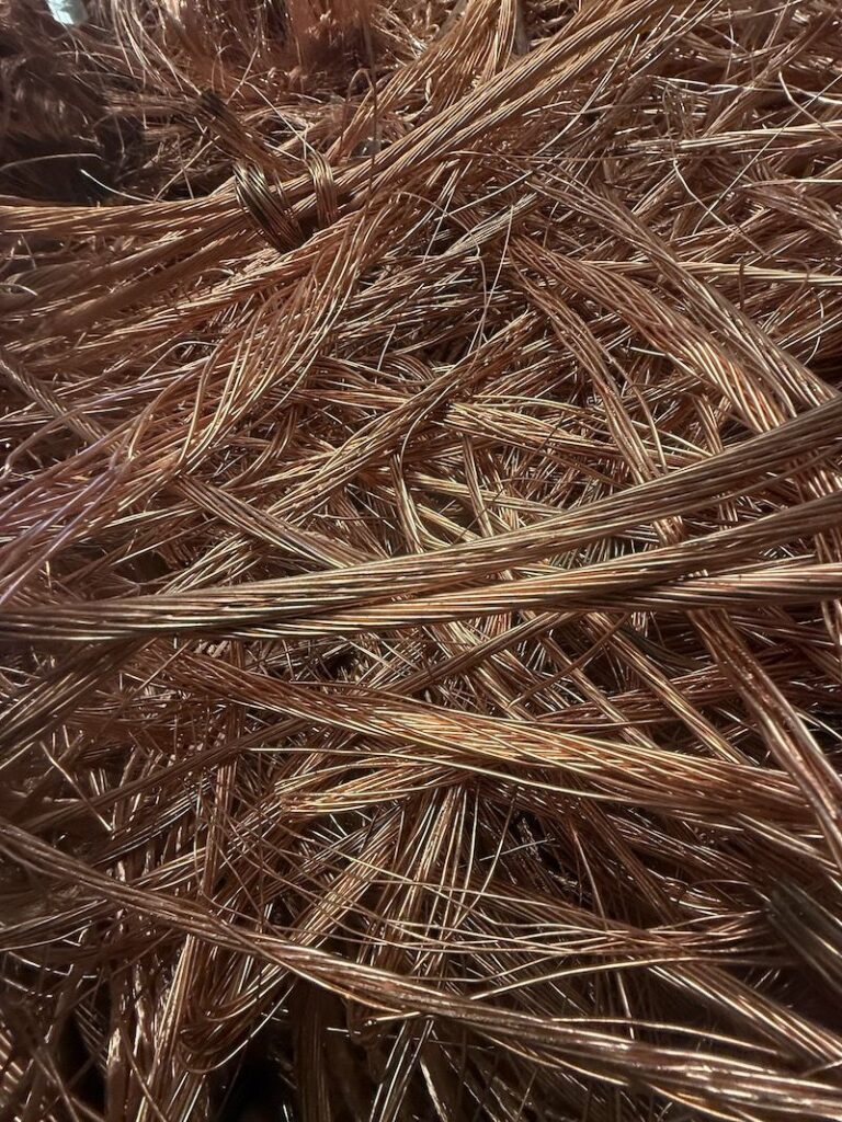Strands of bright copper wire sorted for recycling in Perth